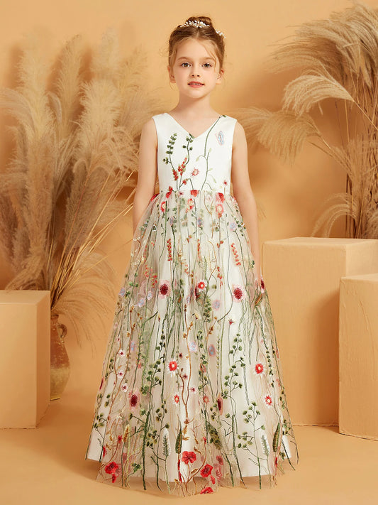 Heowos ivory flower girl dress with a sleeveless V-neck bodice and floor-length tulle skirt embroidered with colorful wildflowers and green stems.