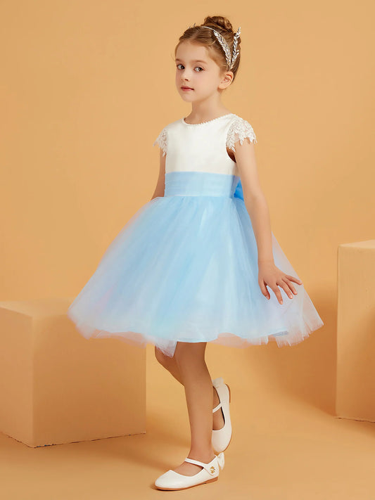 Heowos sky blue and ivory flower girl dress with a pearl-trimmed round neckline, lace cap sleeves, pleated blue sash and knee-length tulle skirt.