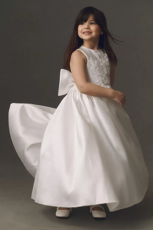 Heowos white first communion dress with a round neckline, sleeveless floral lace bodice, beaded waist and full satin-look skirt.