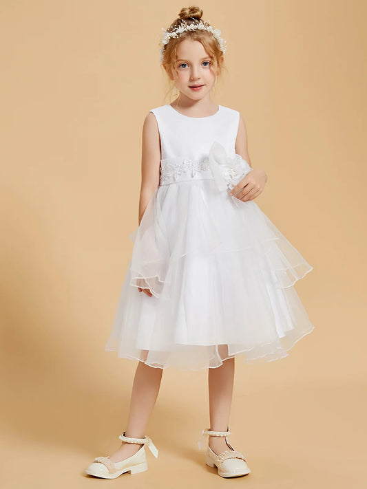 Heowos white tea-length flower girl dress with lace waistband, statement bow, sleeveless bodice, and layered organza skirt, front view