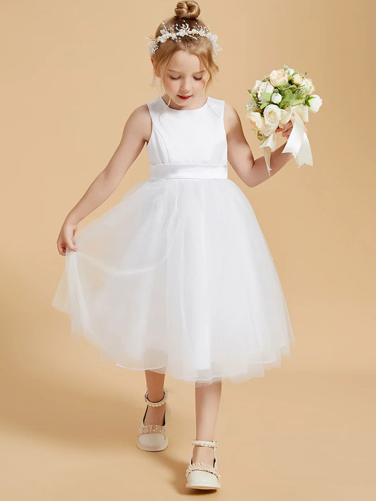 Heowos white tea-length Communion dress, front view with round neck, sleeveless satin bodice, wide waistband and tulle skirt.