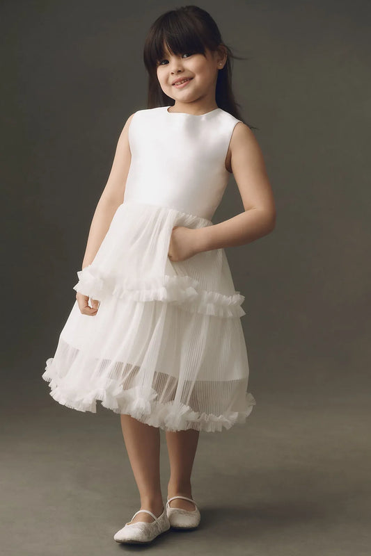 Heowos white tiered flower girl dress with ruffle trim, styled with a sheer layer featuring lace cuffs.