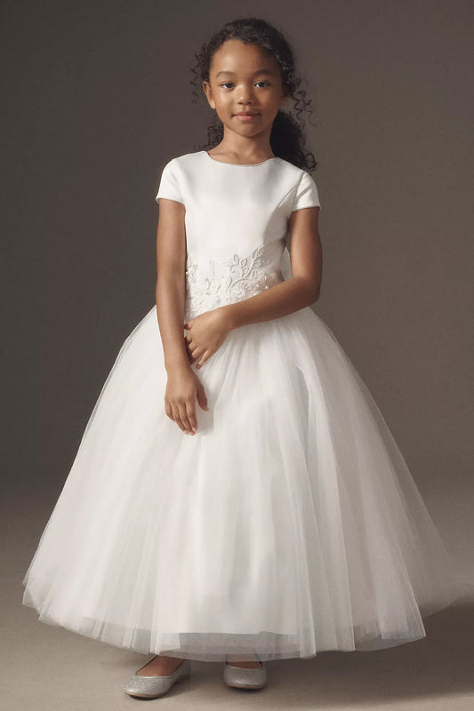 Heowos white first communion dress with a round neckline, cap sleeves, floral waist detailing and a full ankle-length tulle skirt.