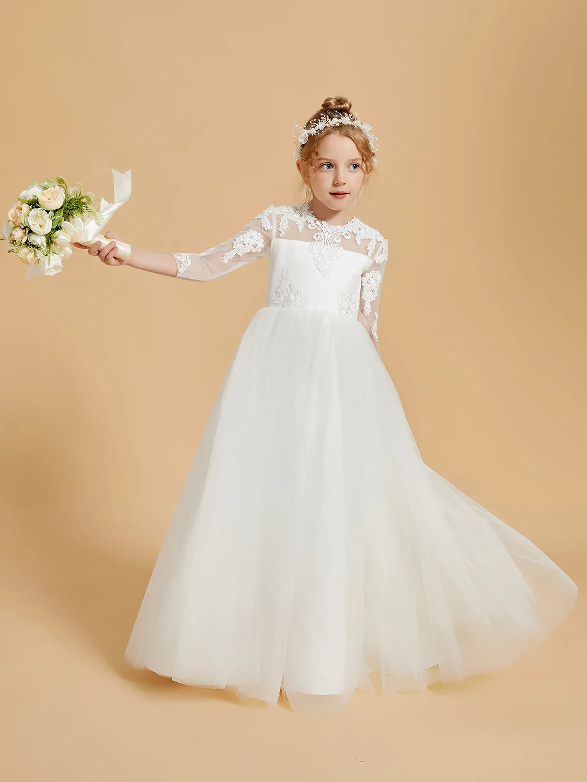 Heowos white Communion dress with lace illusion neckline, sheer three-quarter sleeves and a full floor-length tulle skirt.